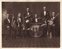 Members of a band in dinner jackets.