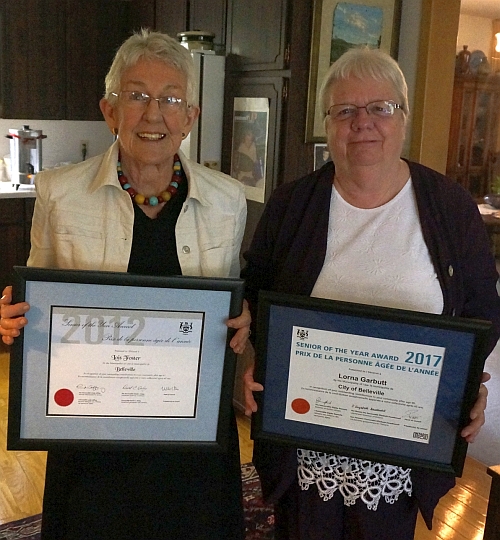 Lois Foster and Lorna Garbutt holding their awards.