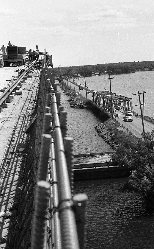 View from bridge under construction, looking down on previous bridge.