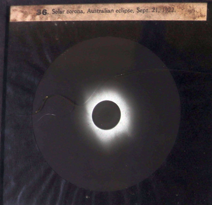 Lantern slide of a solar eclipse over Australia in 1922, from the Province of Ontario Picture Bureau.