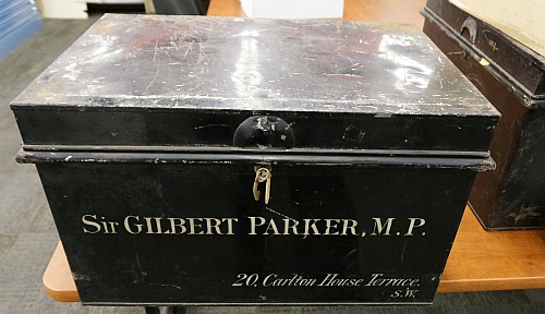 Tin trunk with Sir Gilbert Parker's name.