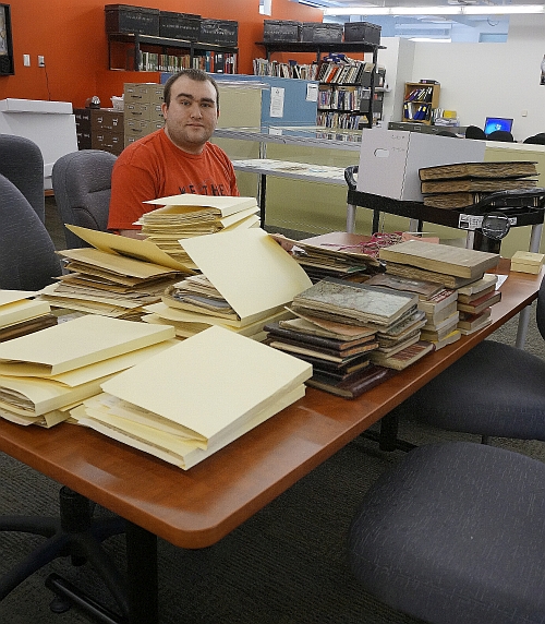 Trevor Parsons with Gilbert Parker papers.