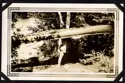 Man carrying a canoe.