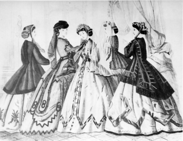 Drawing of women in long dresses.