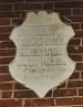 Plaque on Township Hall building.