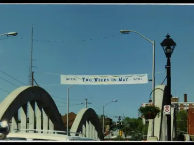 Two Weeks in May banner over the Lower Bridge in Belleville.