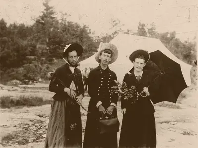 Three men in dresses.