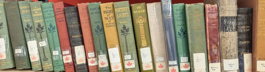 Shelf of published books by Gilbert Parker.