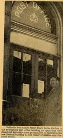 Man standing outside Post Office door.