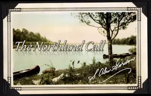 Image of canoes by a waterway with text "The Northland Call" reflected in the water.