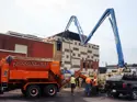 Concrete being pumped into Belleville Public Library building.